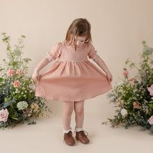 Load image into Gallery viewer, terracotta flax linen dress for baby girl or toddler girl on beige background.