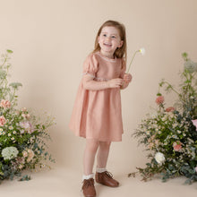 Load image into Gallery viewer, terracotta flax linen dress for baby girl or toddler girl on beige background.