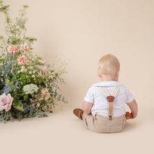 Load image into Gallery viewer, white cotton short sleeve top with peter pan collar and piping for baby boy or toddler boy on beige background.