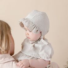 Load image into Gallery viewer, natural flax linen bonnet for baby girl on beige background