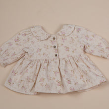 Load image into Gallery viewer, dense brushed cotton vintage floral top with peter pan collar for baby girl or toddler girl on beige background. back view with three wooden buttons
